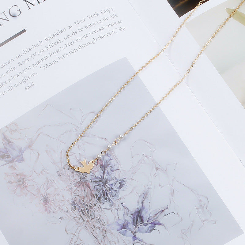 Colombe Pearl Pendant styled on model