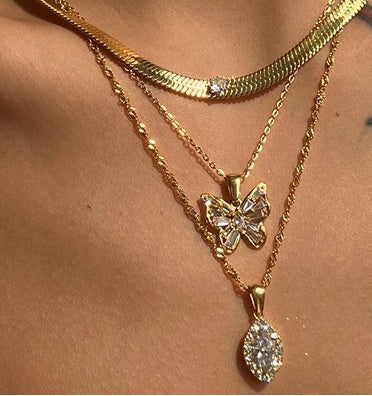 Olivia Zircon Pendant layered with CHIVIQUE necklaces